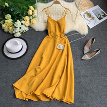 Load image into Gallery viewer, The maldives on holiday backless dress cross condole pure color in Thailand the sea posed a fairy long dress